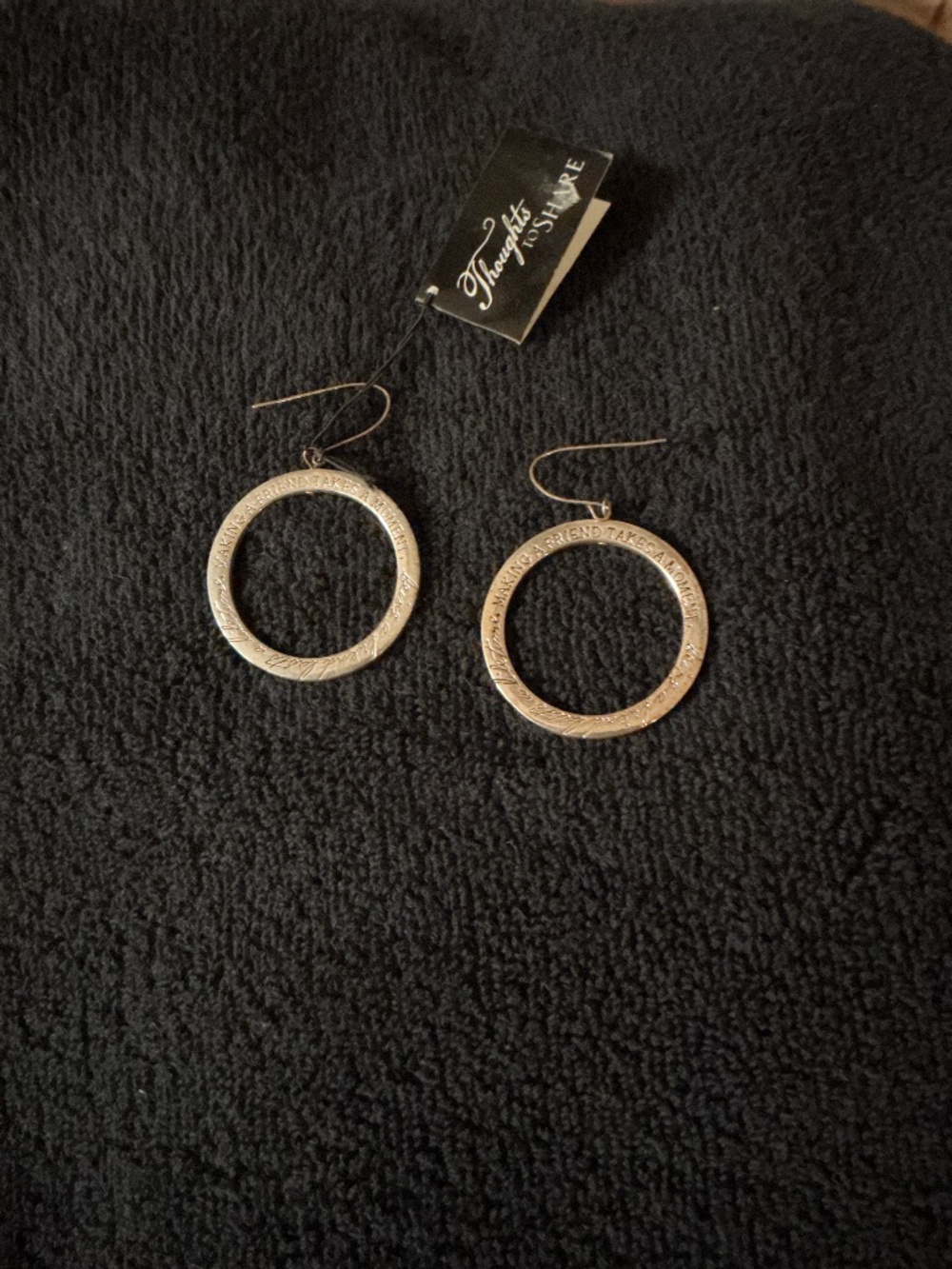 Silver plated hoop earrings. Engraved
